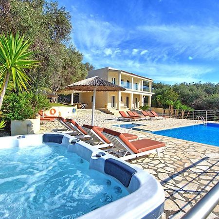 Beachfront Villa Seasun By Posarellivillas Agios Spyridon  Bagian luar foto