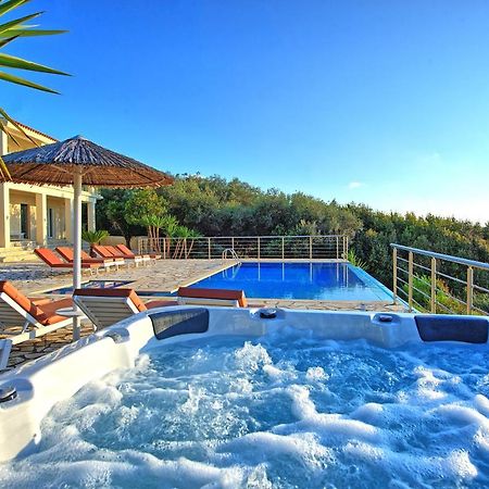 Beachfront Villa Seasun By Posarellivillas Agios Spyridon  Bagian luar foto