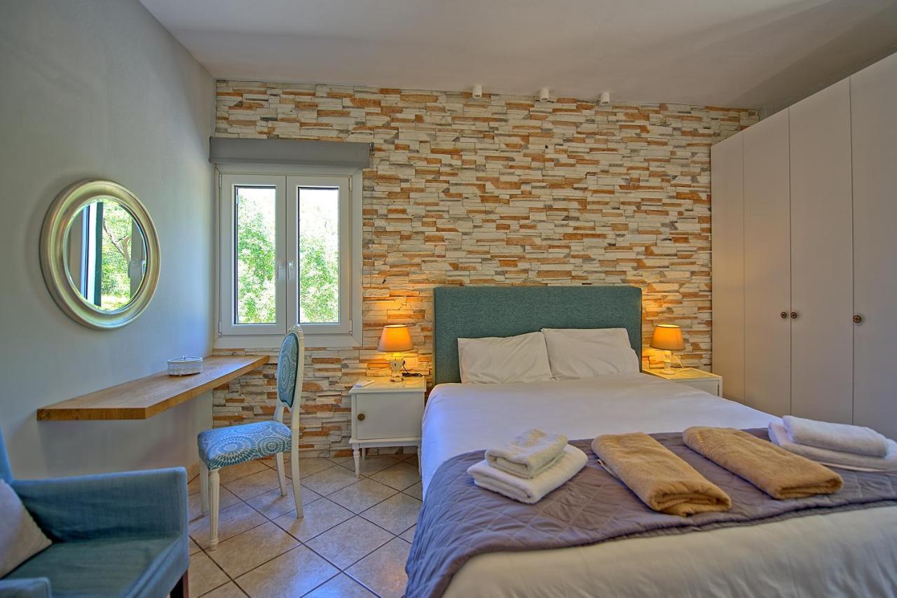 Beachfront Villa Seasun By Posarellivillas Agios Spyridon  Bagian luar foto