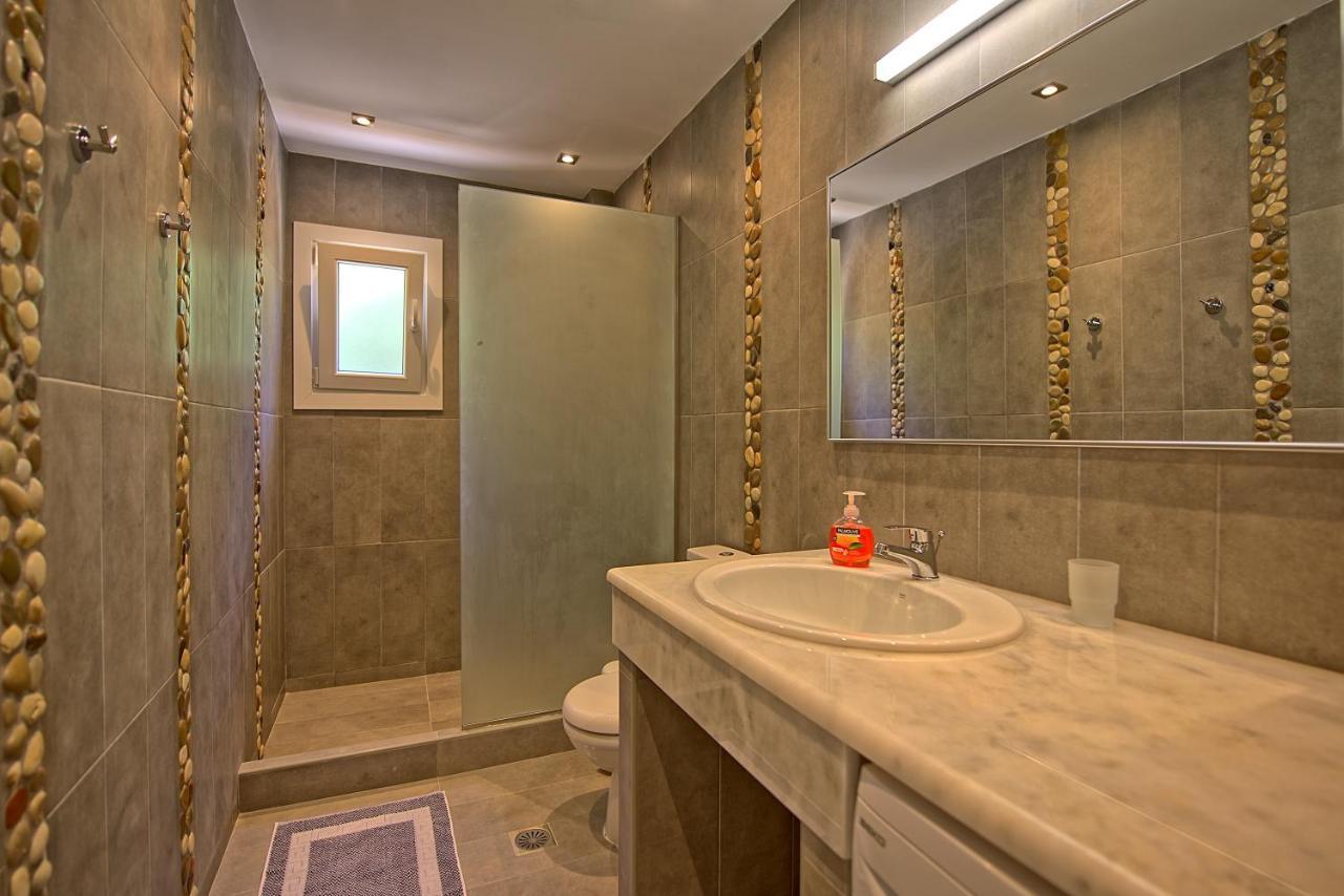 Beachfront Villa Seasun By Posarellivillas Agios Spyridon  Bagian luar foto