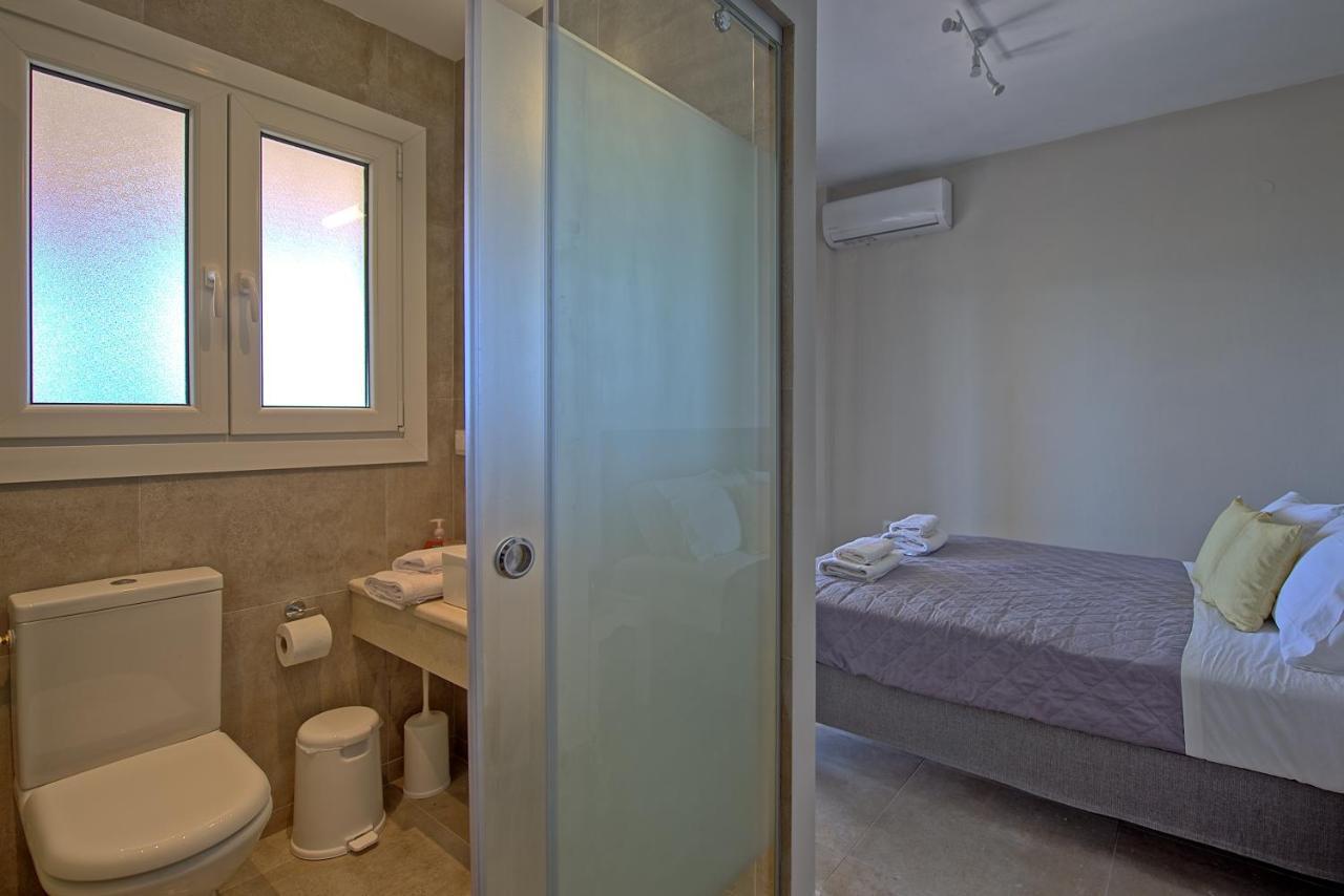 Beachfront Villa Seasun By Posarellivillas Agios Spyridon  Bagian luar foto
