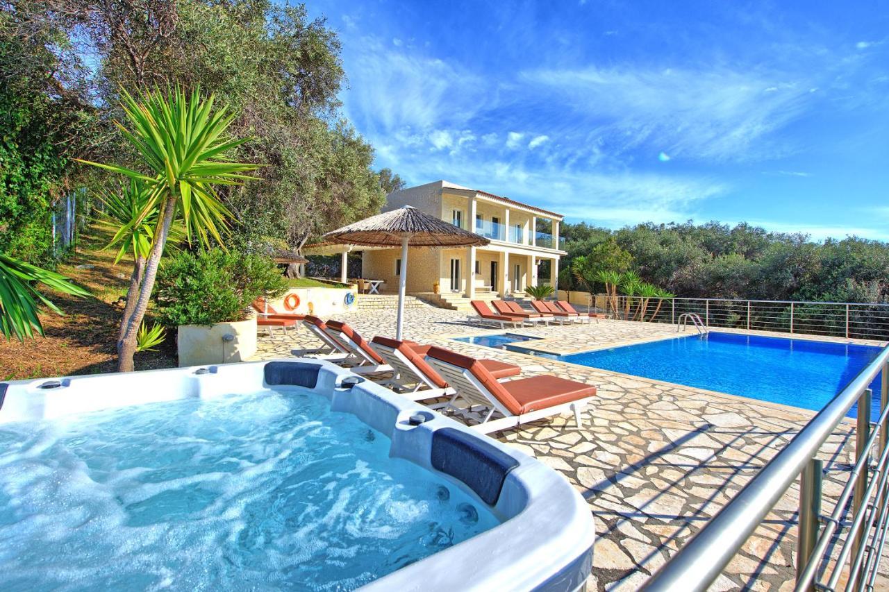 Beachfront Villa Seasun By Posarellivillas Agios Spyridon  Bagian luar foto