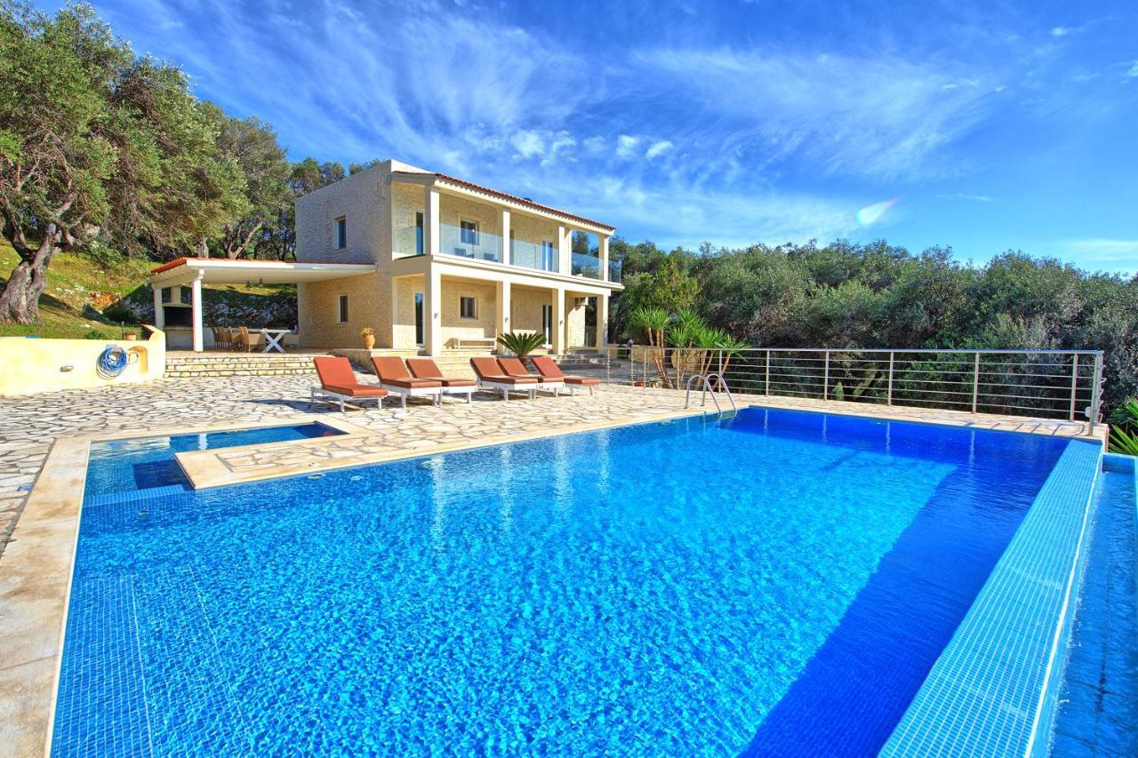 Beachfront Villa Seasun By Posarellivillas Agios Spyridon  Bagian luar foto