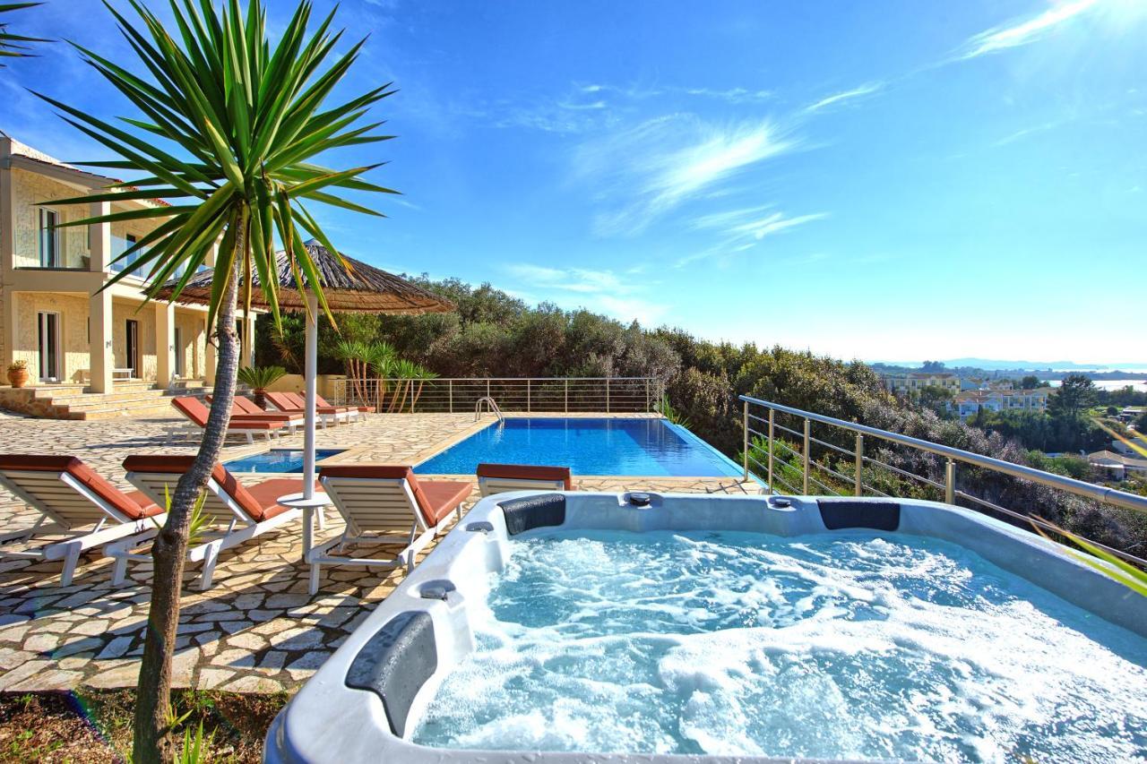 Beachfront Villa Seasun By Posarellivillas Agios Spyridon  Bagian luar foto