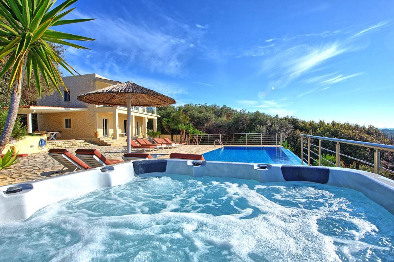 Beachfront Villa Seasun By Posarellivillas Agios Spyridon  Bagian luar foto