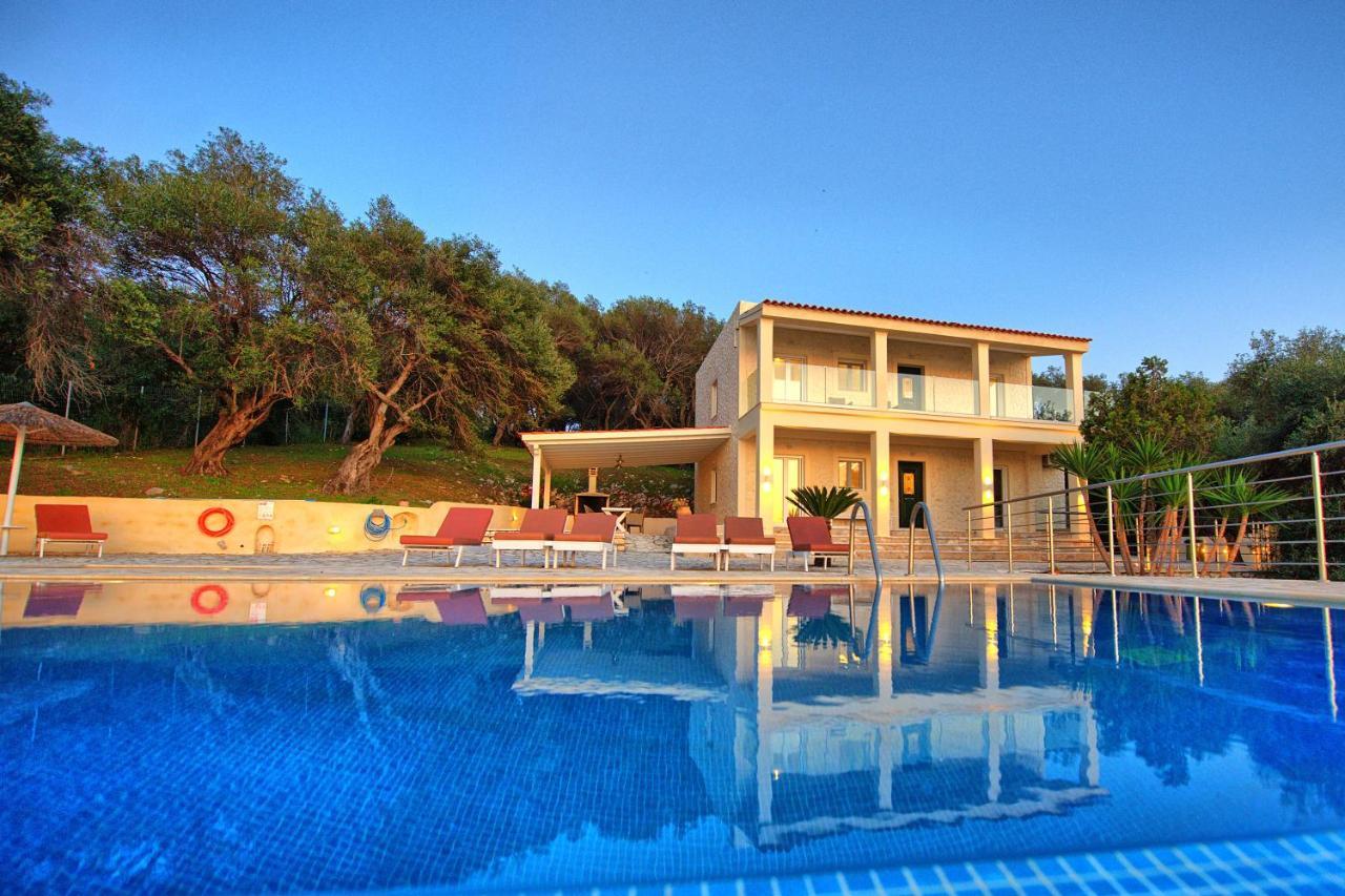 Beachfront Villa Seasun By Posarellivillas Agios Spyridon  Bagian luar foto