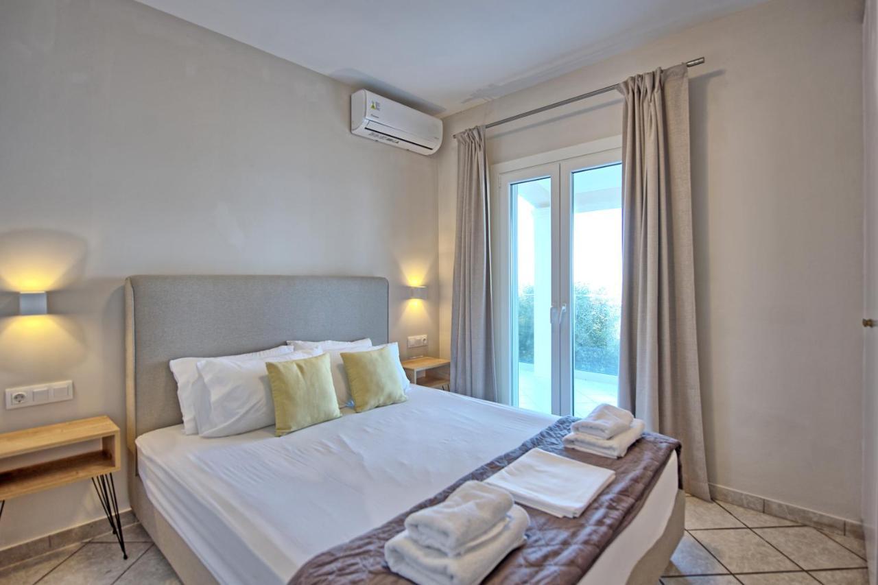 Beachfront Villa Seasun By Posarellivillas Agios Spyridon  Bagian luar foto