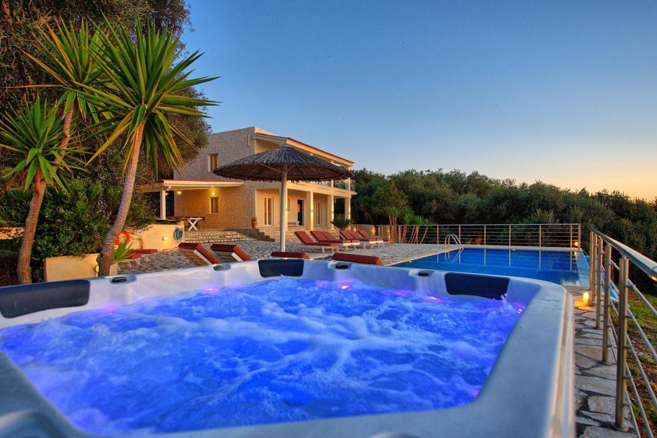 Beachfront Villa Seasun By Posarellivillas Agios Spyridon  Bagian luar foto