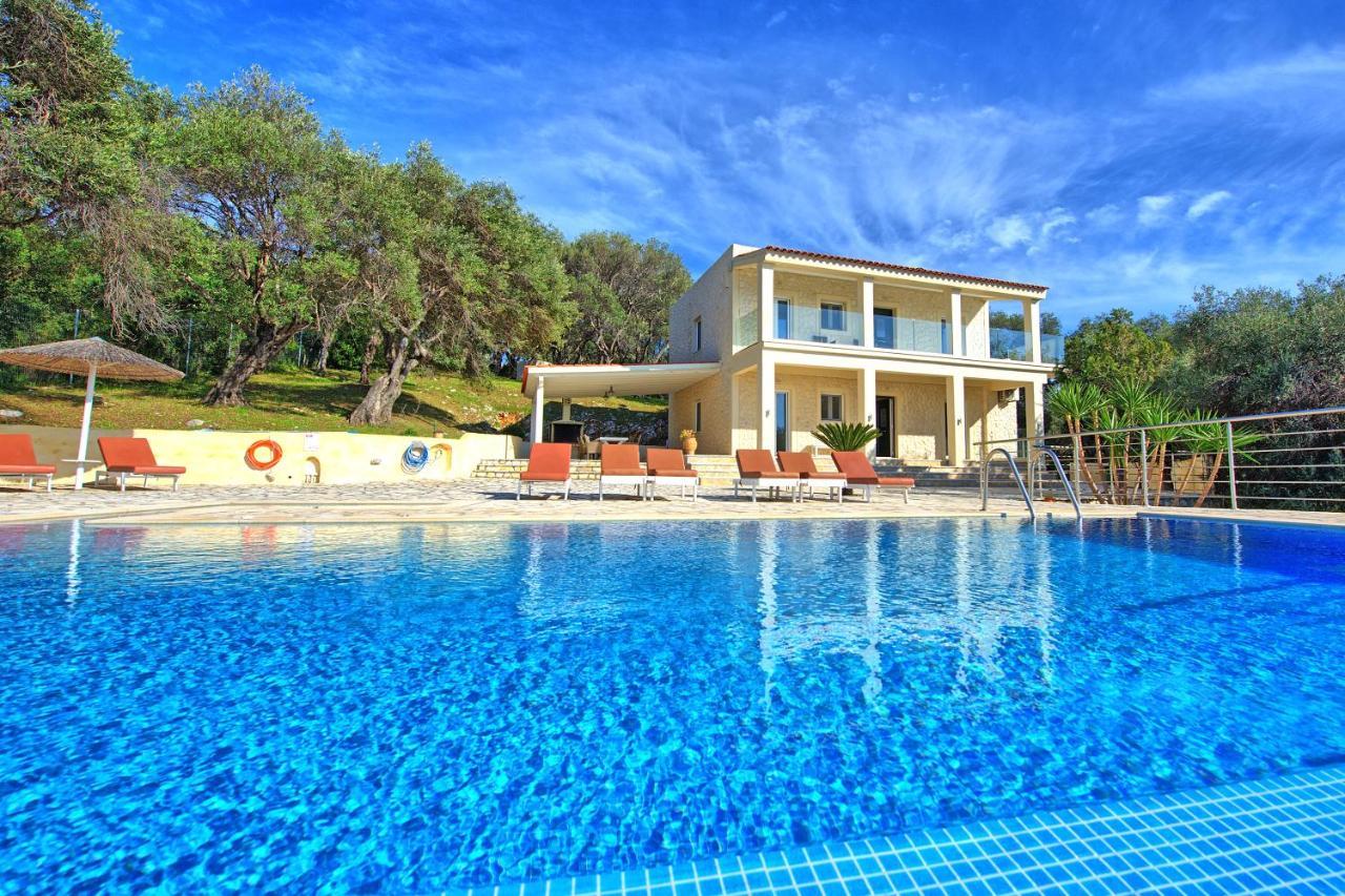 Beachfront Villa Seasun By Posarellivillas Agios Spyridon  Bagian luar foto