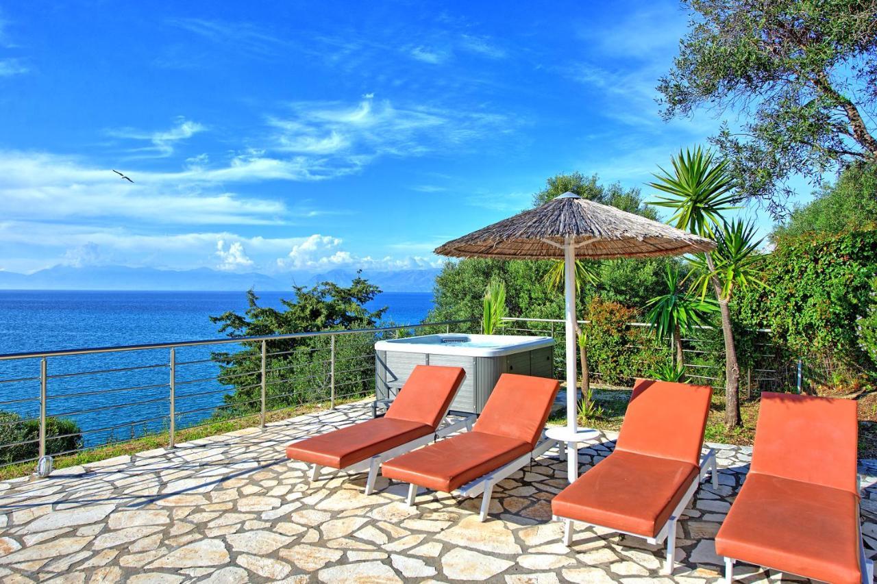 Beachfront Villa Seasun By Posarellivillas Agios Spyridon  Bagian luar foto