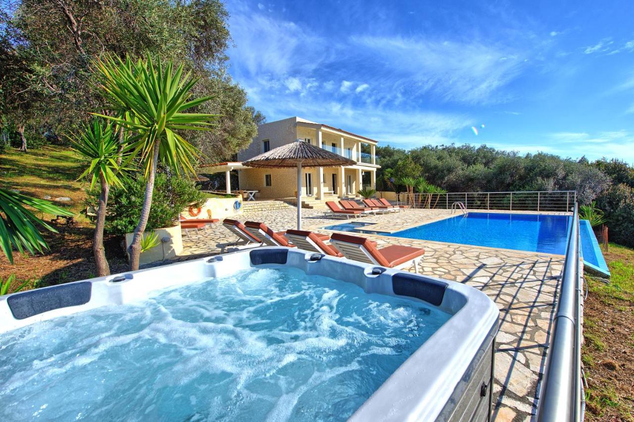Beachfront Villa Seasun By Posarellivillas Agios Spyridon  Bagian luar foto