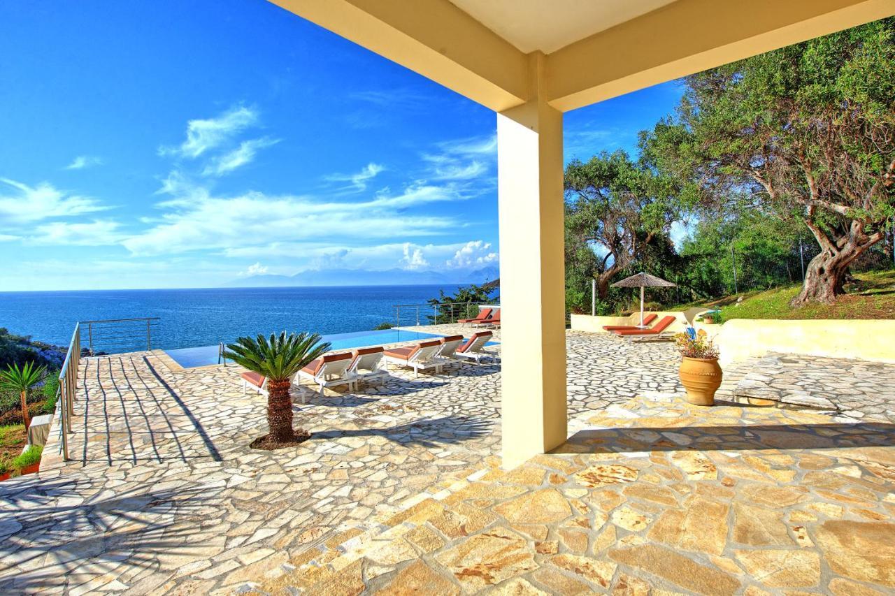 Beachfront Villa Seasun By Posarellivillas Agios Spyridon  Bagian luar foto