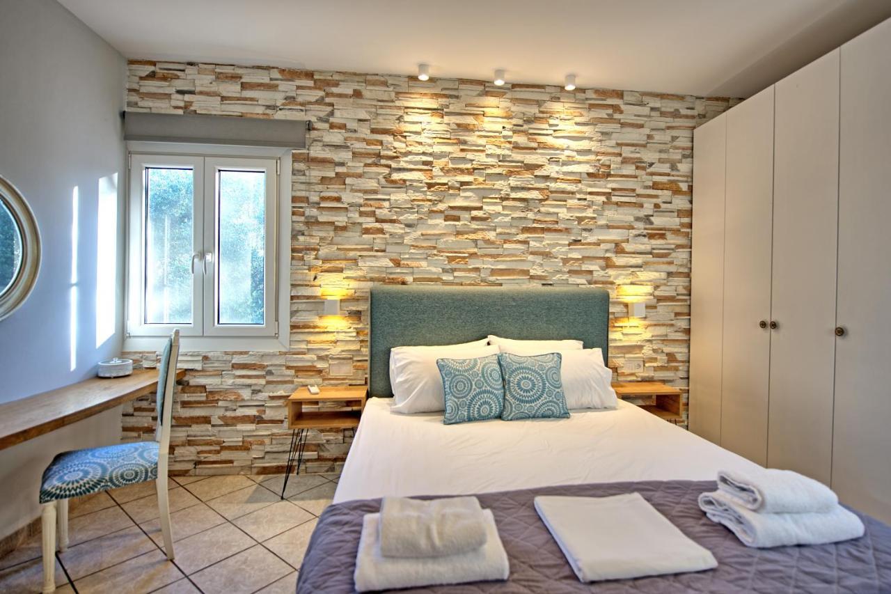Beachfront Villa Seasun By Posarellivillas Agios Spyridon  Bagian luar foto