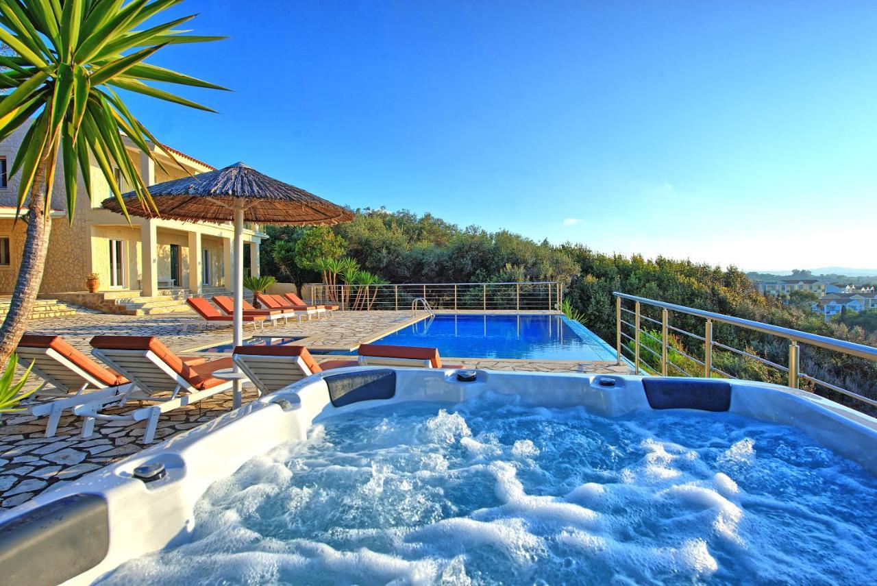 Beachfront Villa Seasun By Posarellivillas Agios Spyridon  Bagian luar foto