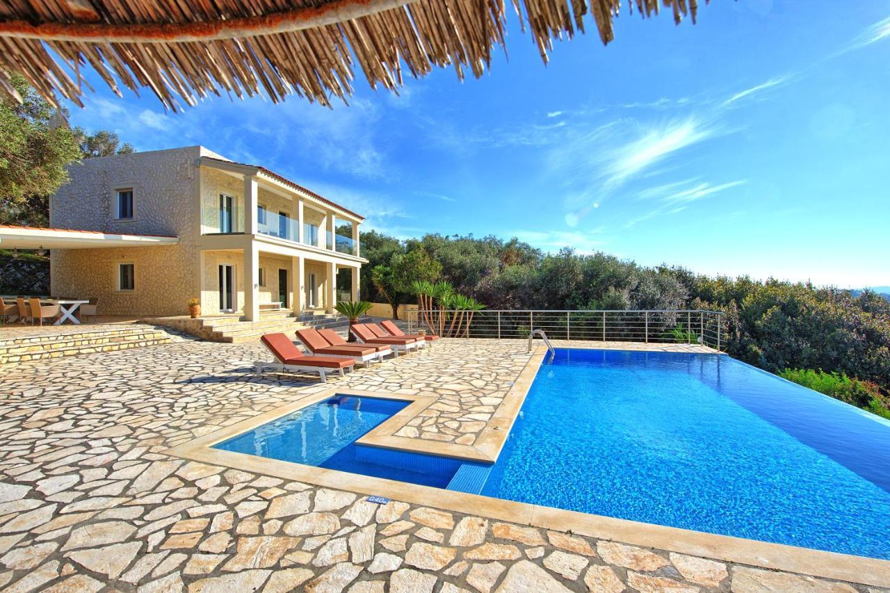 Beachfront Villa Seasun By Posarellivillas Agios Spyridon  Bagian luar foto
